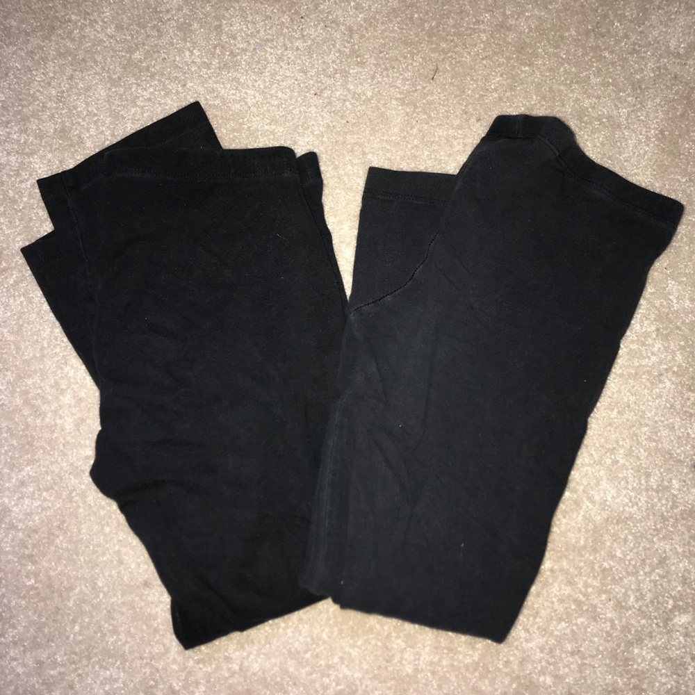 Two pairs of black cropped leggings